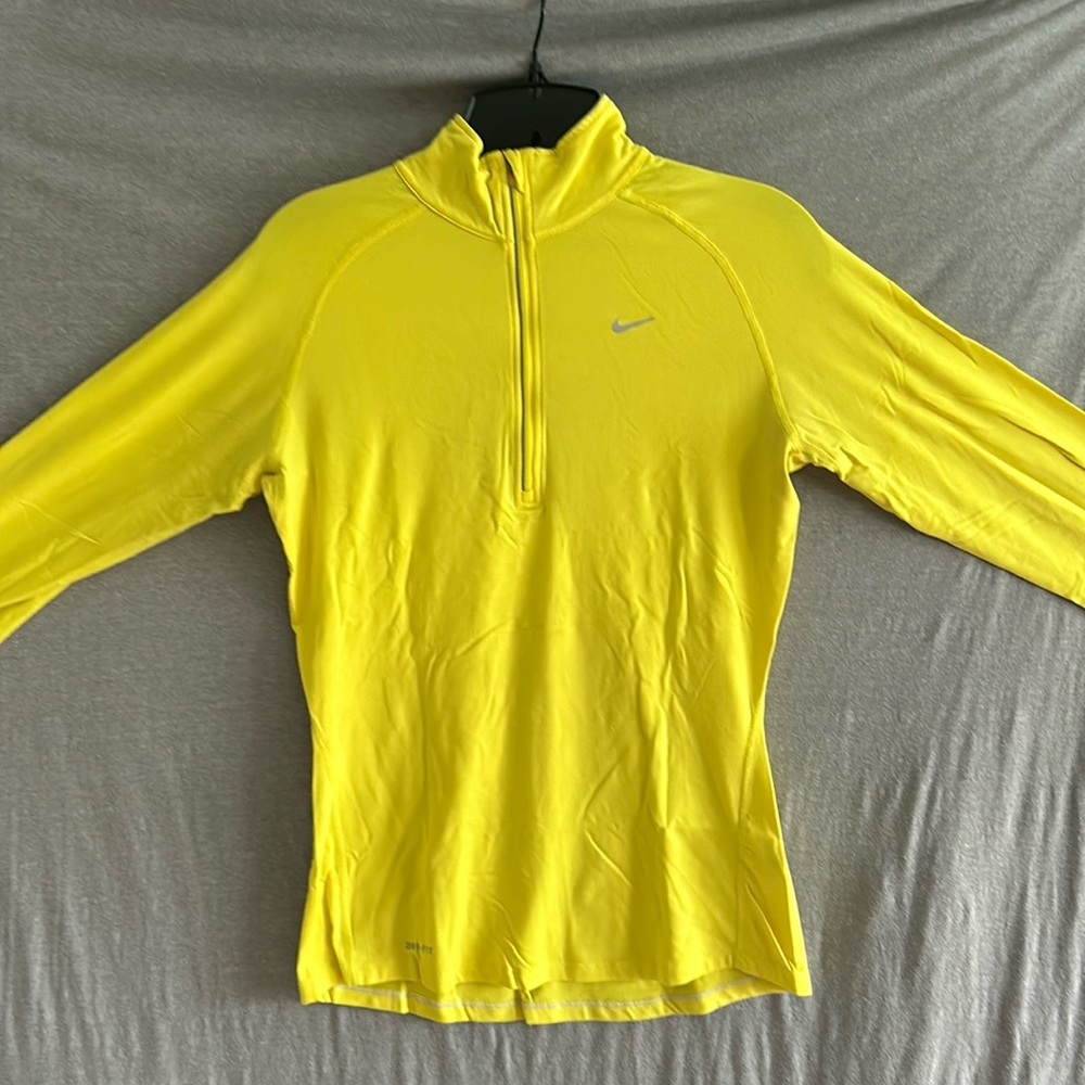 Womens nike dri-fit 1/4 zip. Used but plenty of life. Yellow. Small.